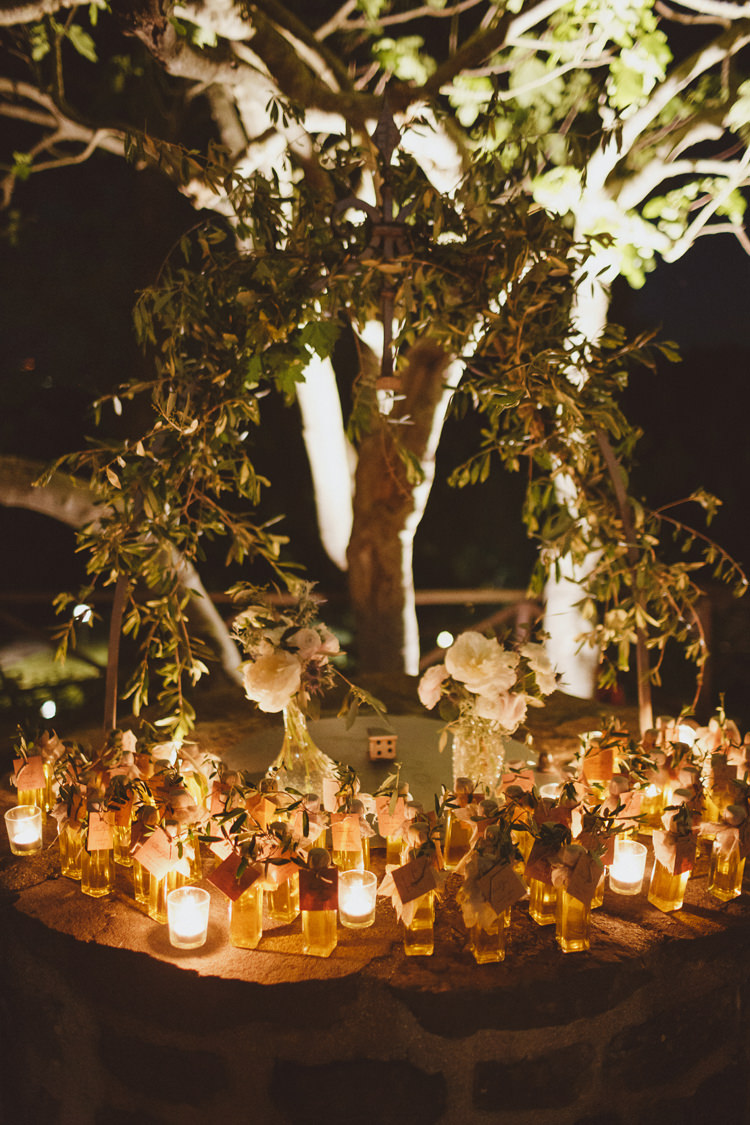 Candles Bottles Flowers Greenery Decor Beautifully Intimate Open Air Wedding Umbria http://www.edpeers.com/